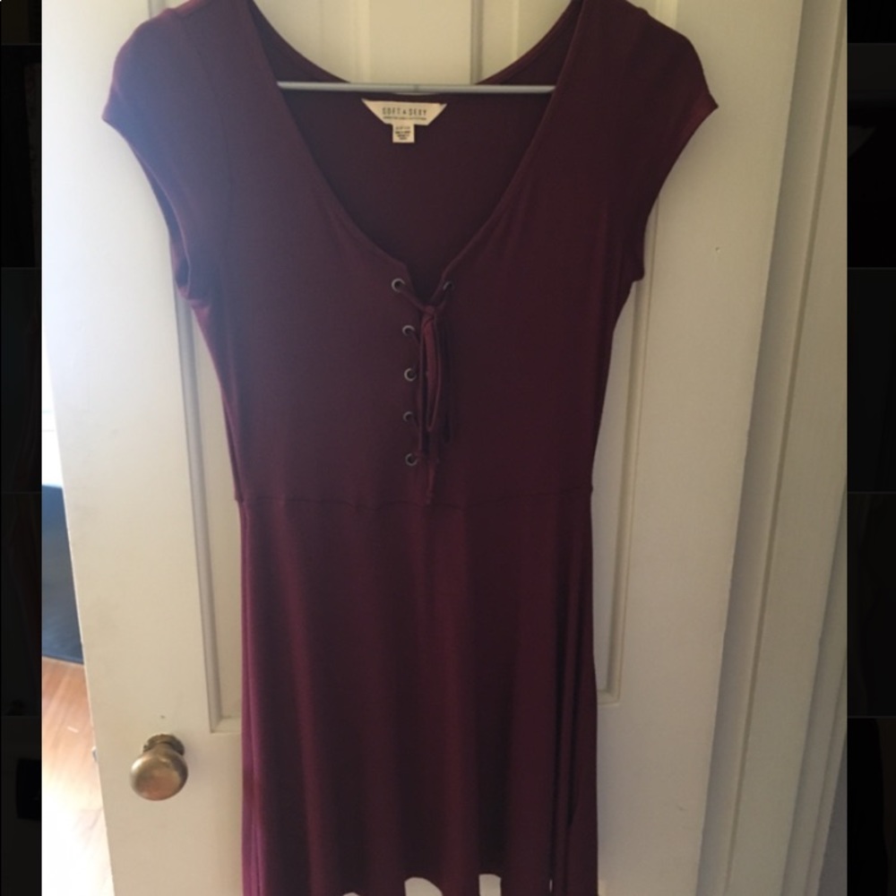 Maroon t-shirt dress with lace up front.